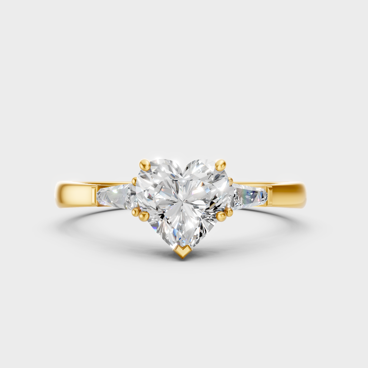 Classic Yellow Gold Three-Stone Engagement Ring Featuring A Heart And Baguettes